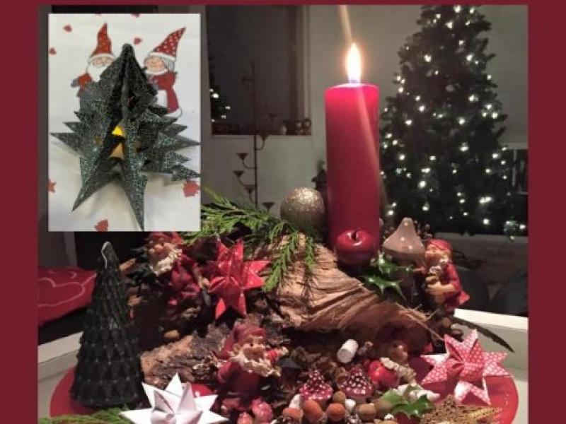 Juledekoration og et klippet juletræ.